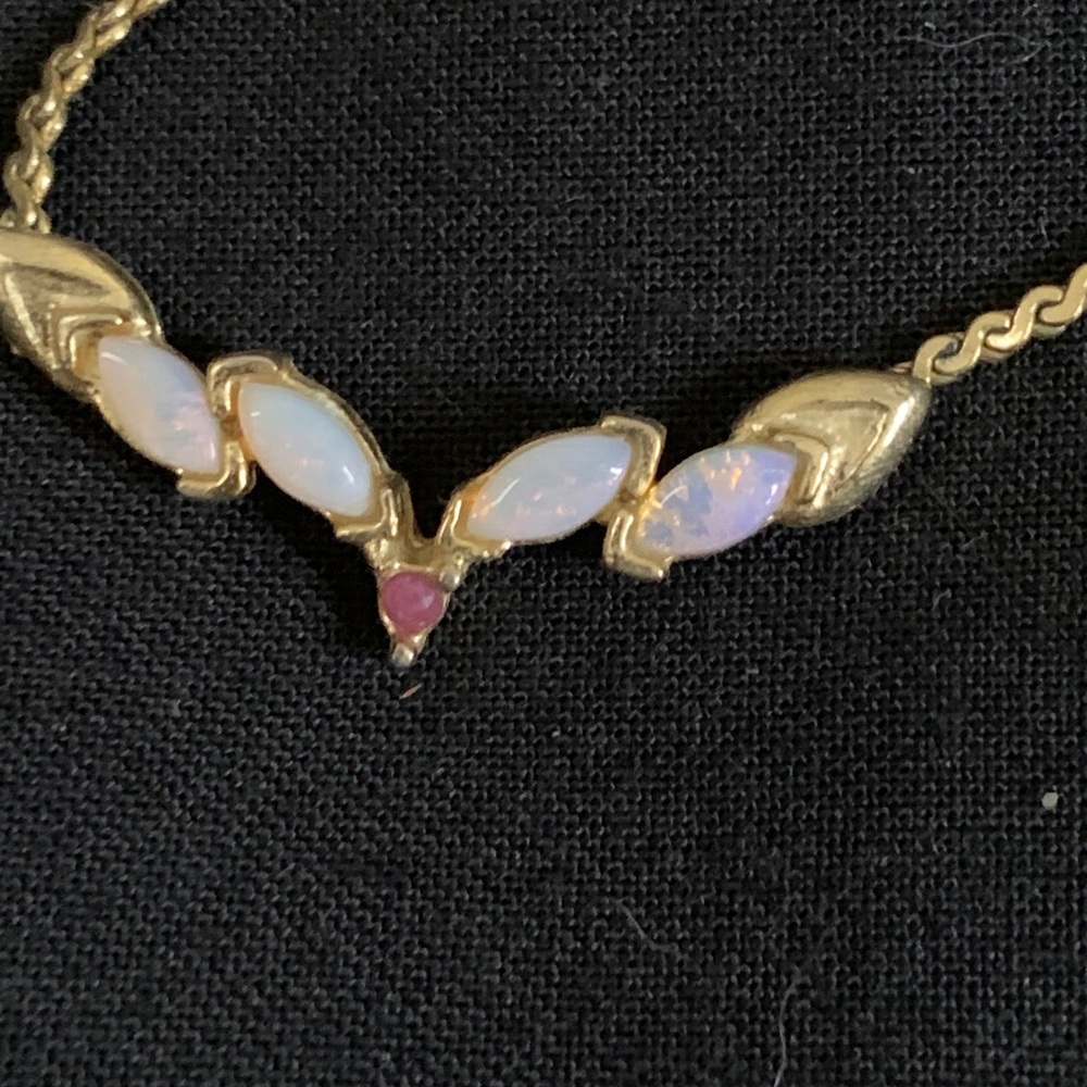 Gold opal and ruby necklace